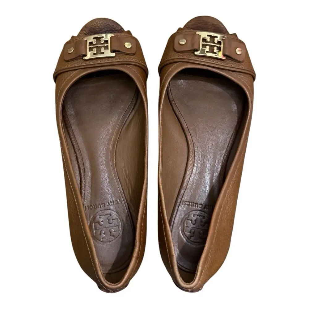 Tory Burch description step