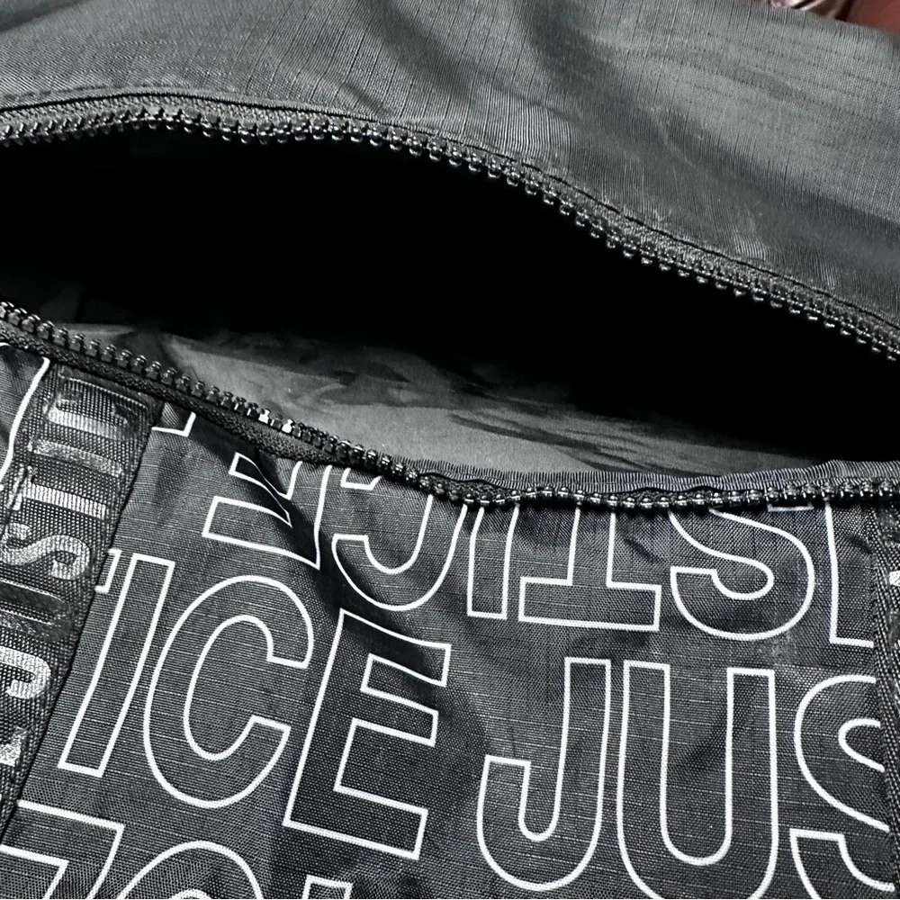 Justice logo black