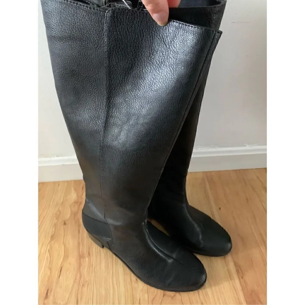 Black riding boots, size 9.5with expendable calf