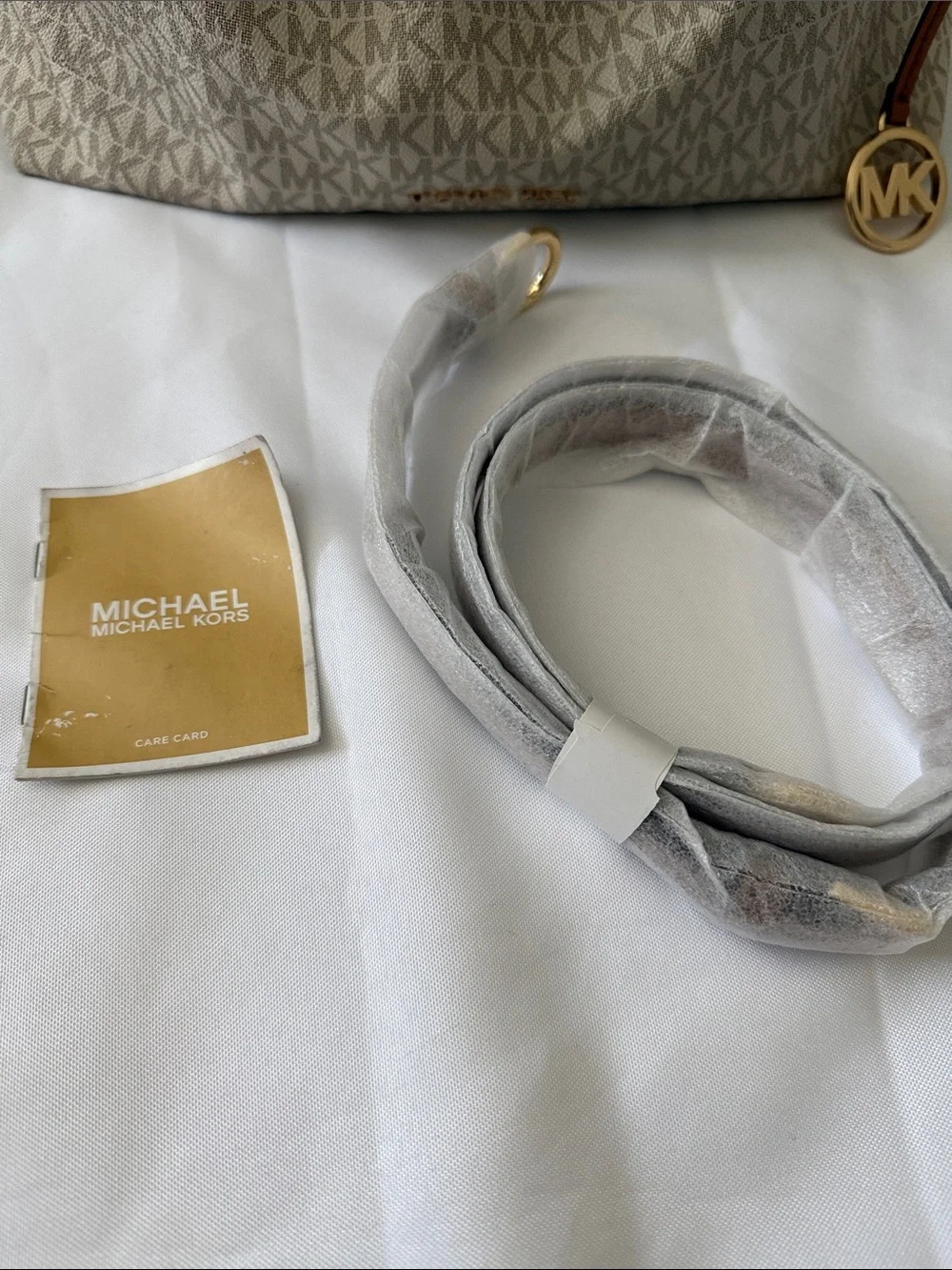 Michael Kors tan that