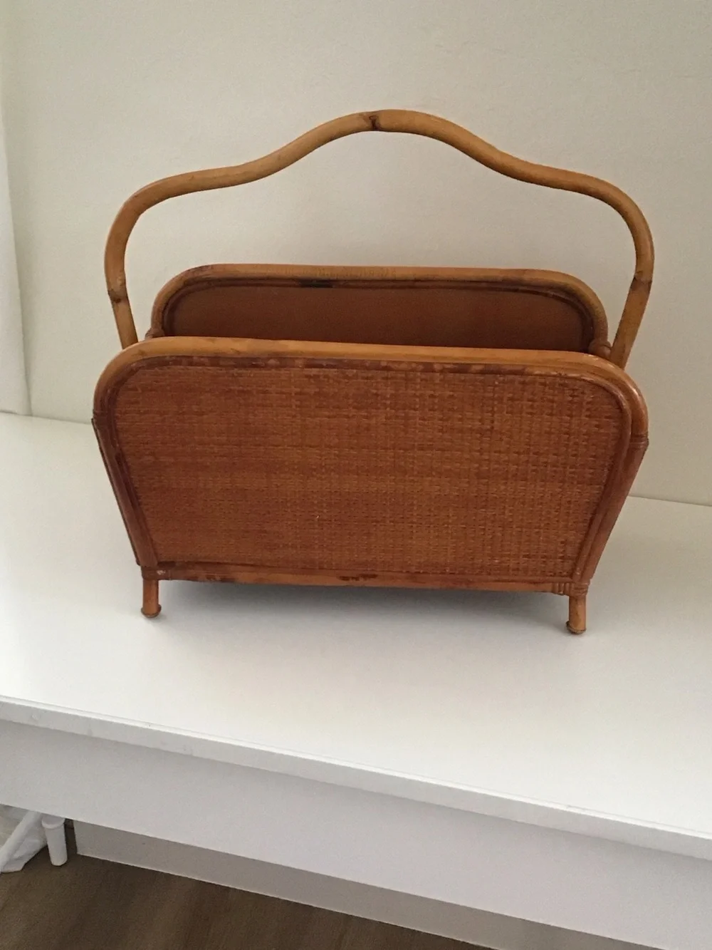 Vintage 1950s magazine rack bent bamboo frame, woven rattan side