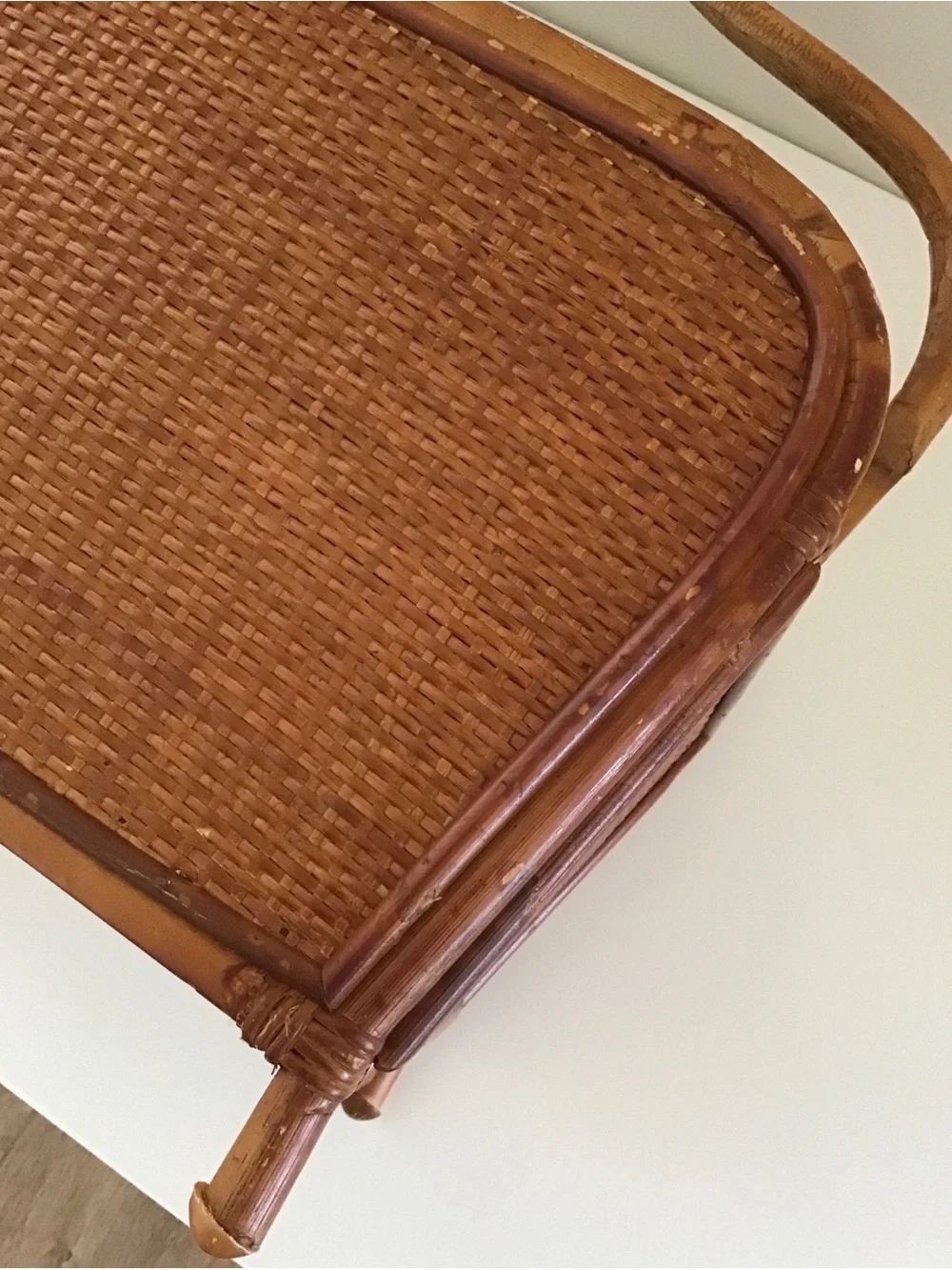 Vintage 1950s magazine rack bent bamboo frame, woven rattan side