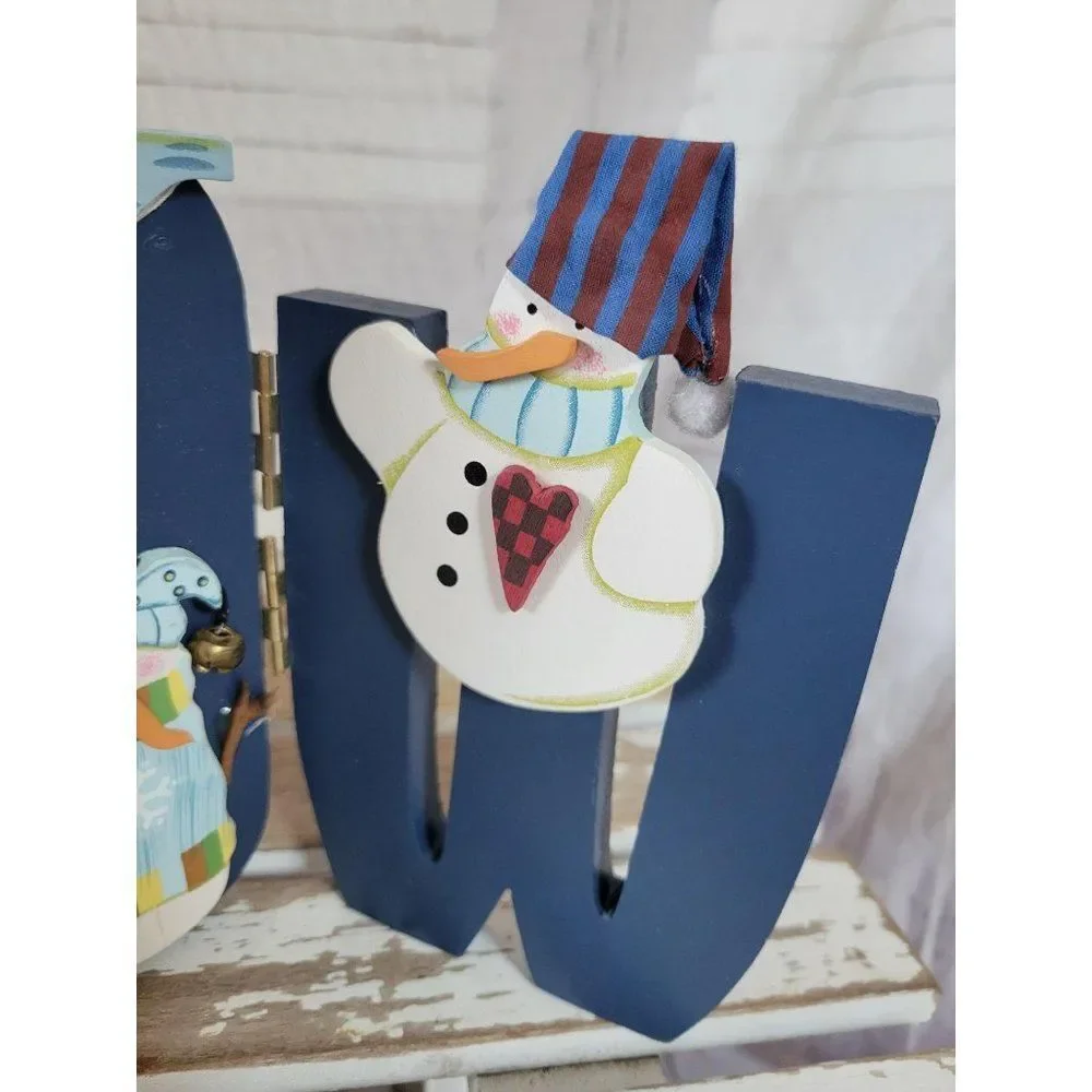folk art snowman snow