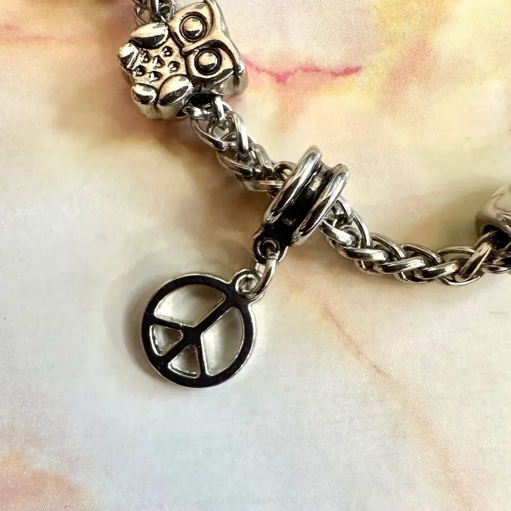 Silver tone bird flower peace owl charm bracelet