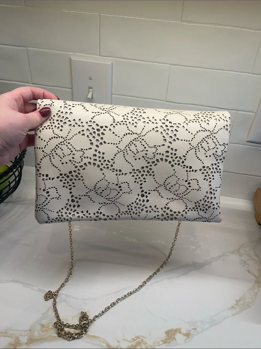 Urban Expressions cream wristlet