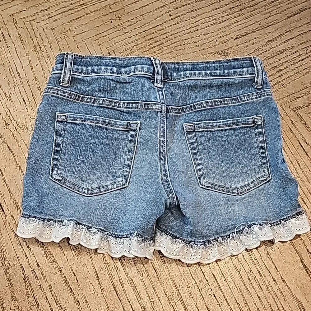 Denim whith white lace trim shorts size 7/8 Cat& Jack