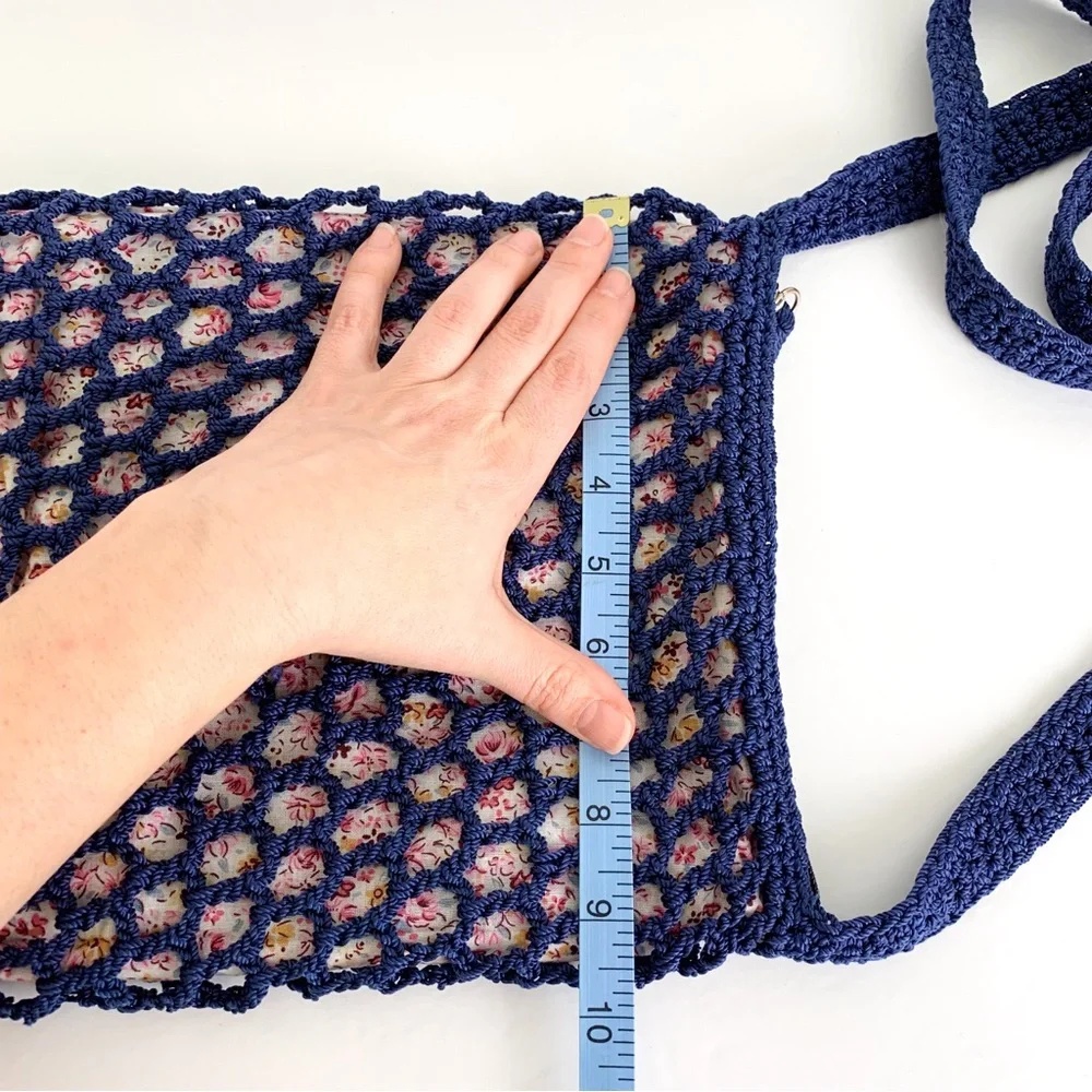 Vintage Mudd crossbody crochet or macrame bag, navy with pink floral lining
