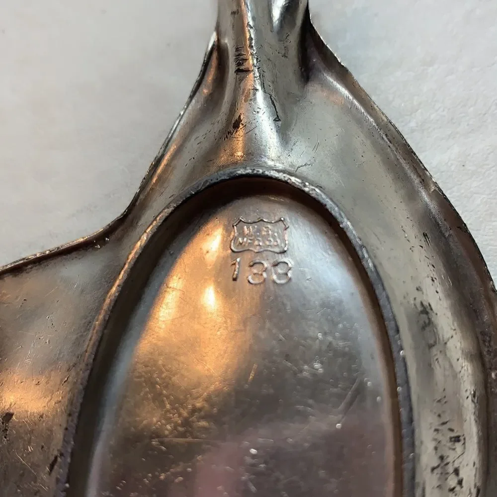 W B Mfg Co vintage silver