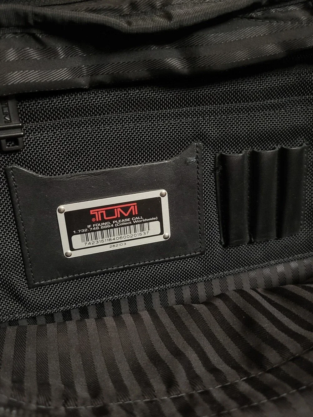 Tumi paperwork replaced genuine