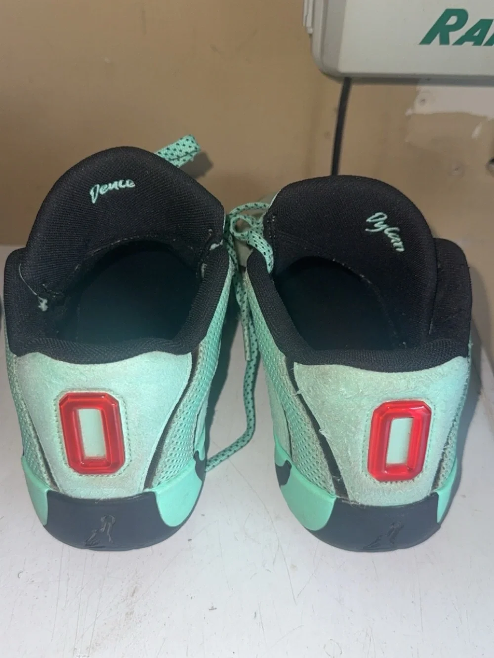 Jordan Mint Green and Black High-Top Sneakers