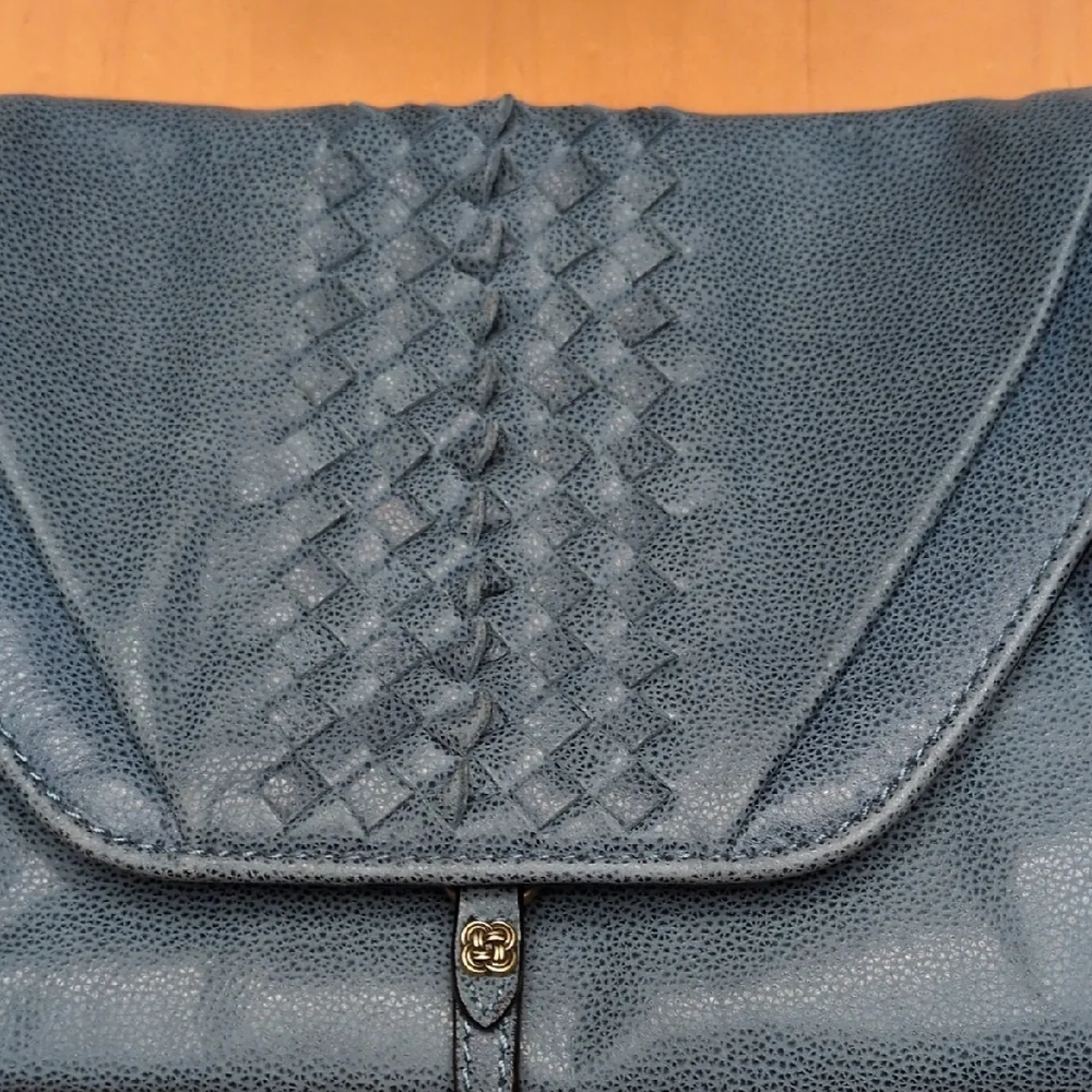 Elliott Lucca elegant teal