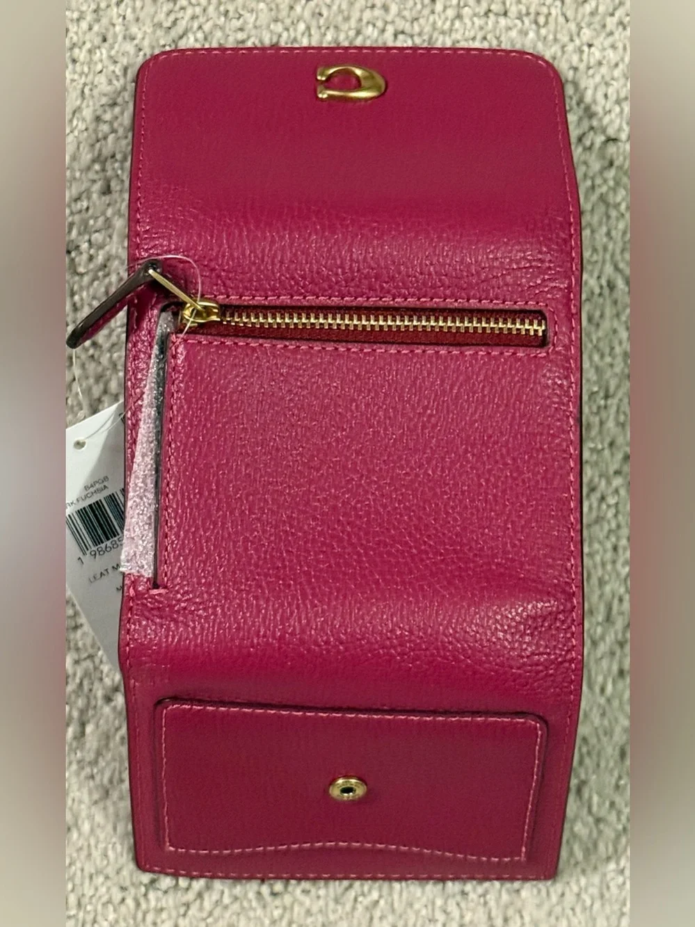 Coach compact pebbled