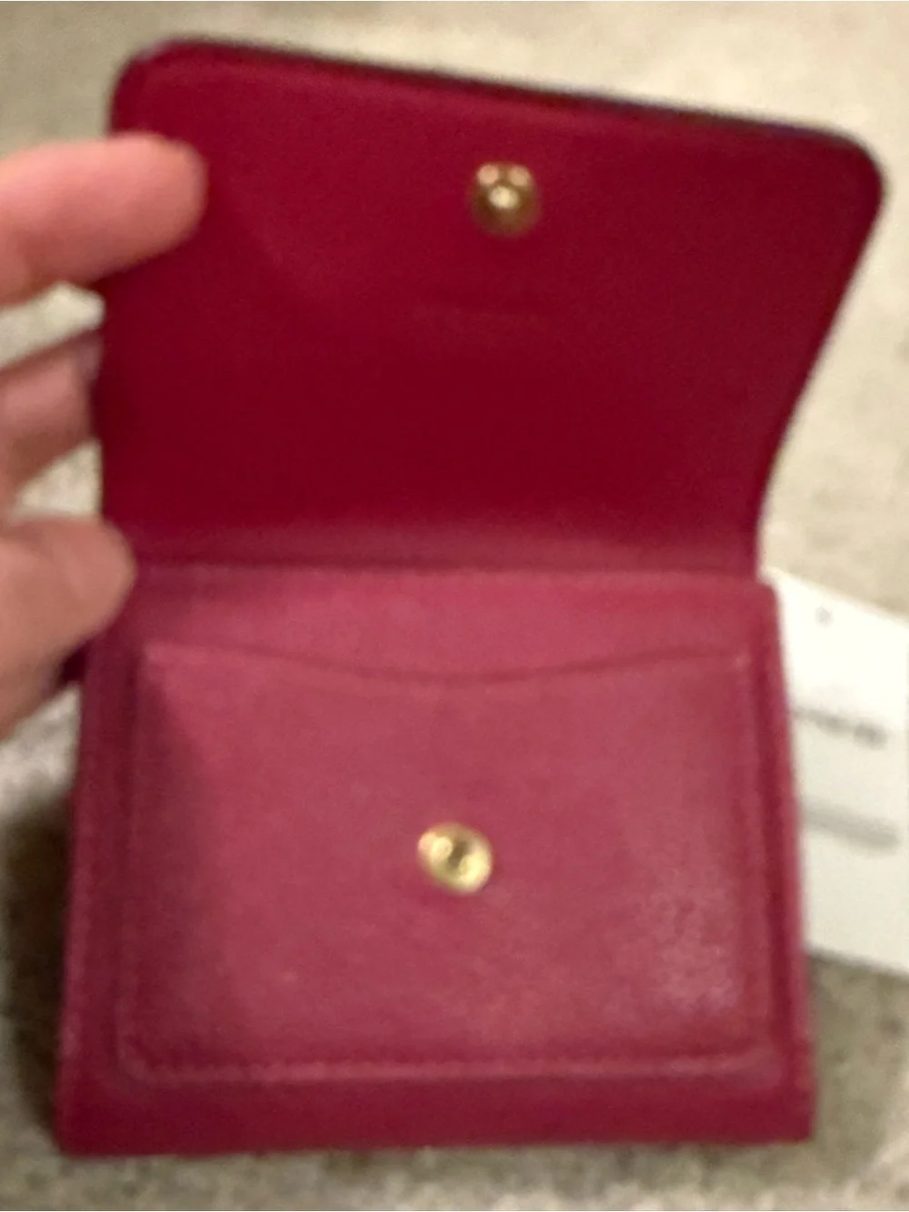 Coach compact pebbled