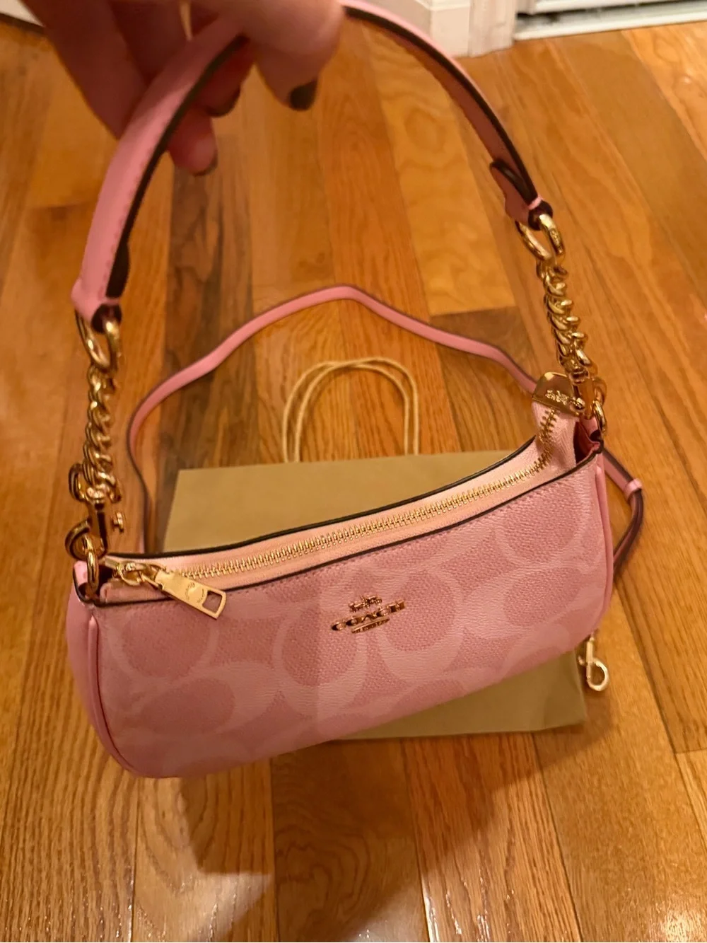Coach strap hardware compact