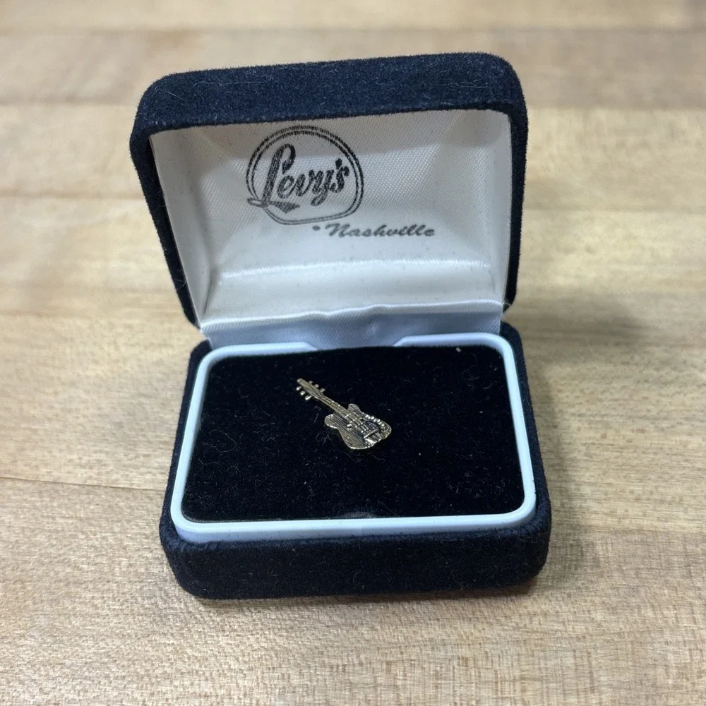 Vintage Gold Tone Electric Guitar Tie Tack Lapel Pin w/ Levy's Nashville
