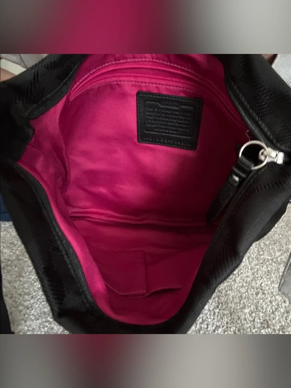 Coach sleek black