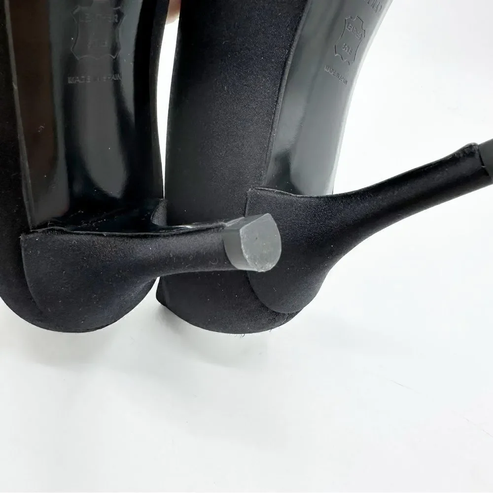 Stuart Weitzman curved sides