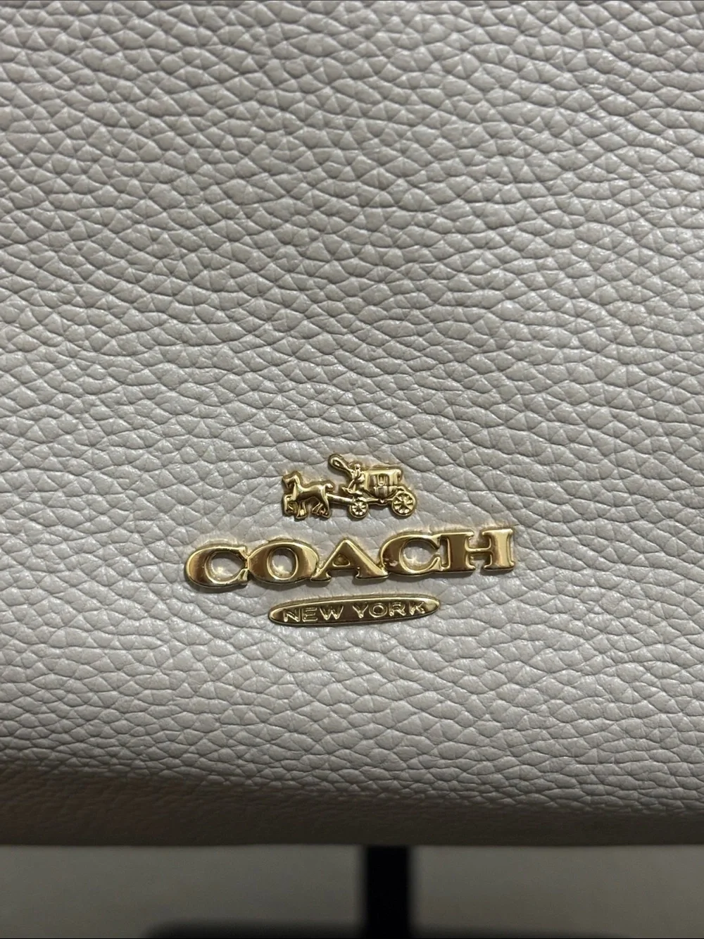 Coach spacious pebbled