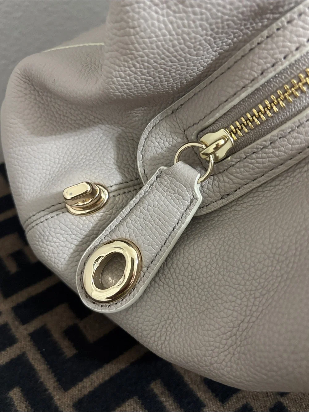 Coach spacious pebbled