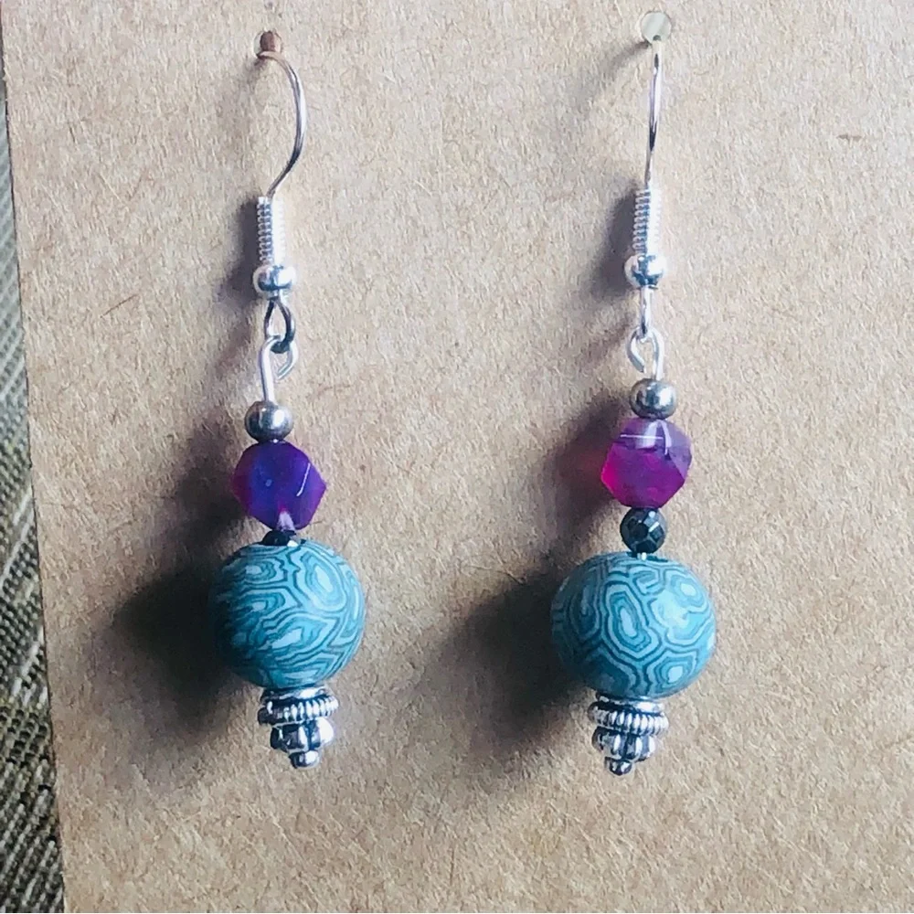 Hand Crafted long metal shown