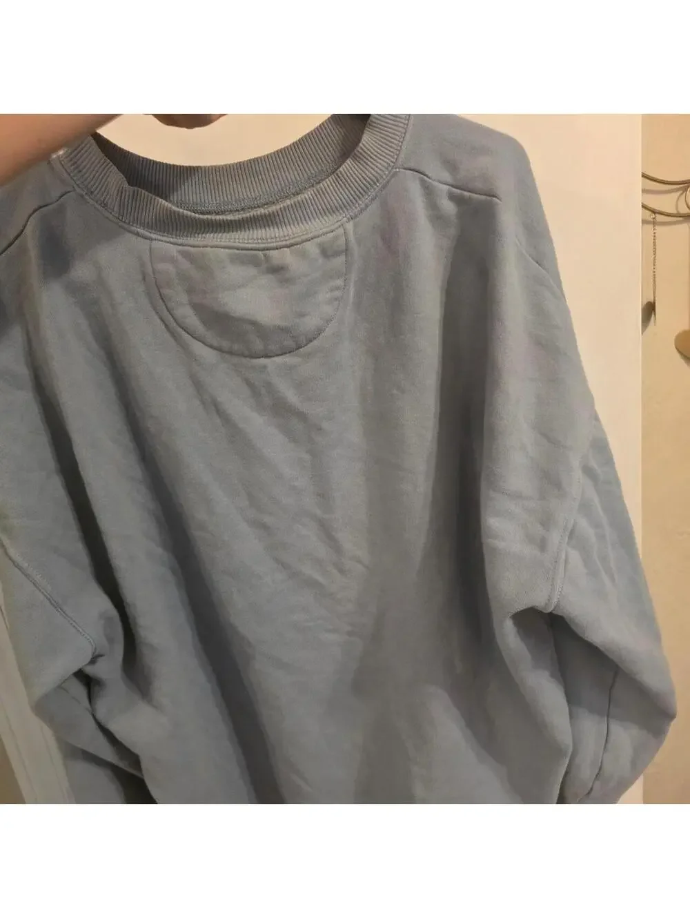 American Eagle Outfitters light blue crewneck sweatshirt with sun graphic size m