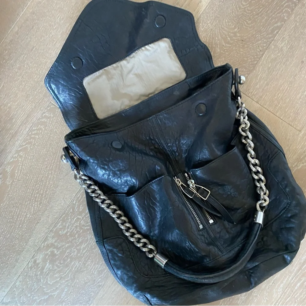 Olivia Harris black leather