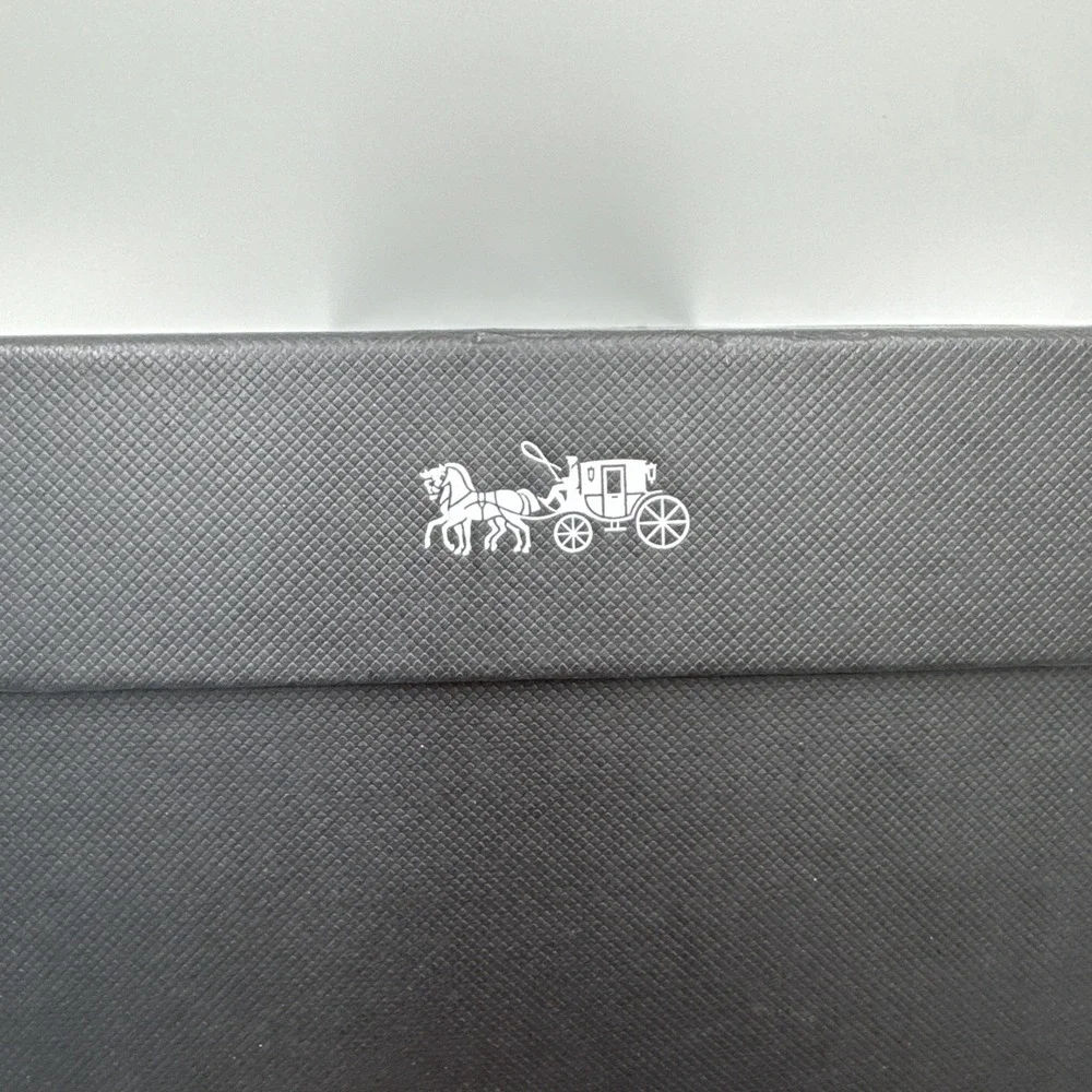 Coach new signature