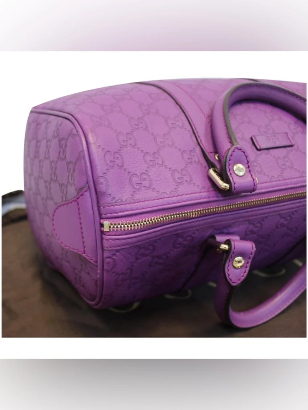 Gucci embossed leather