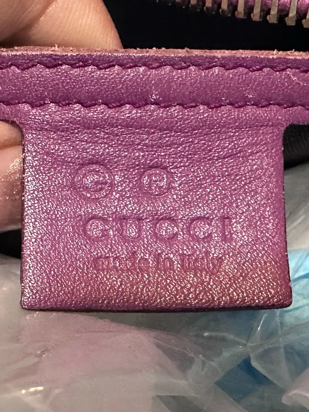 Gucci embossed leather