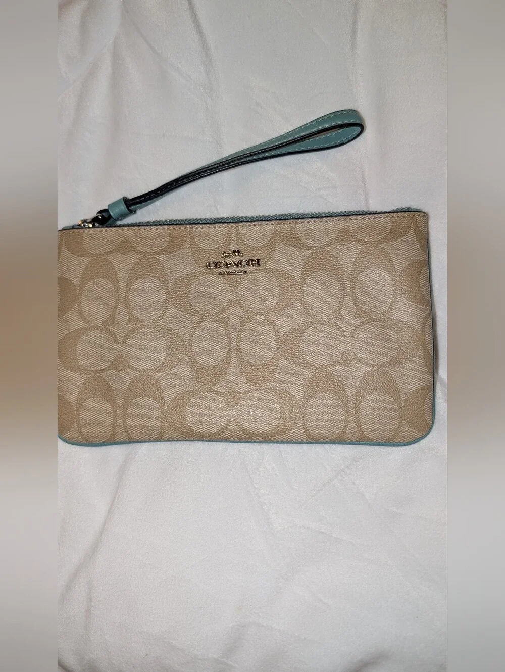 Coach wristlet crafted