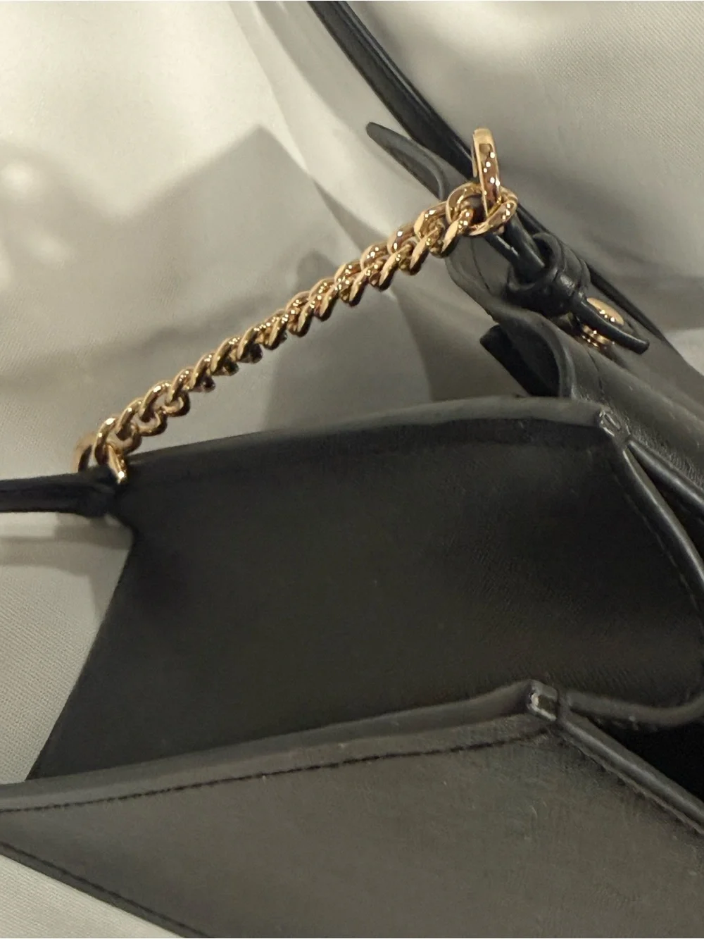 Michael Kors signs front leather