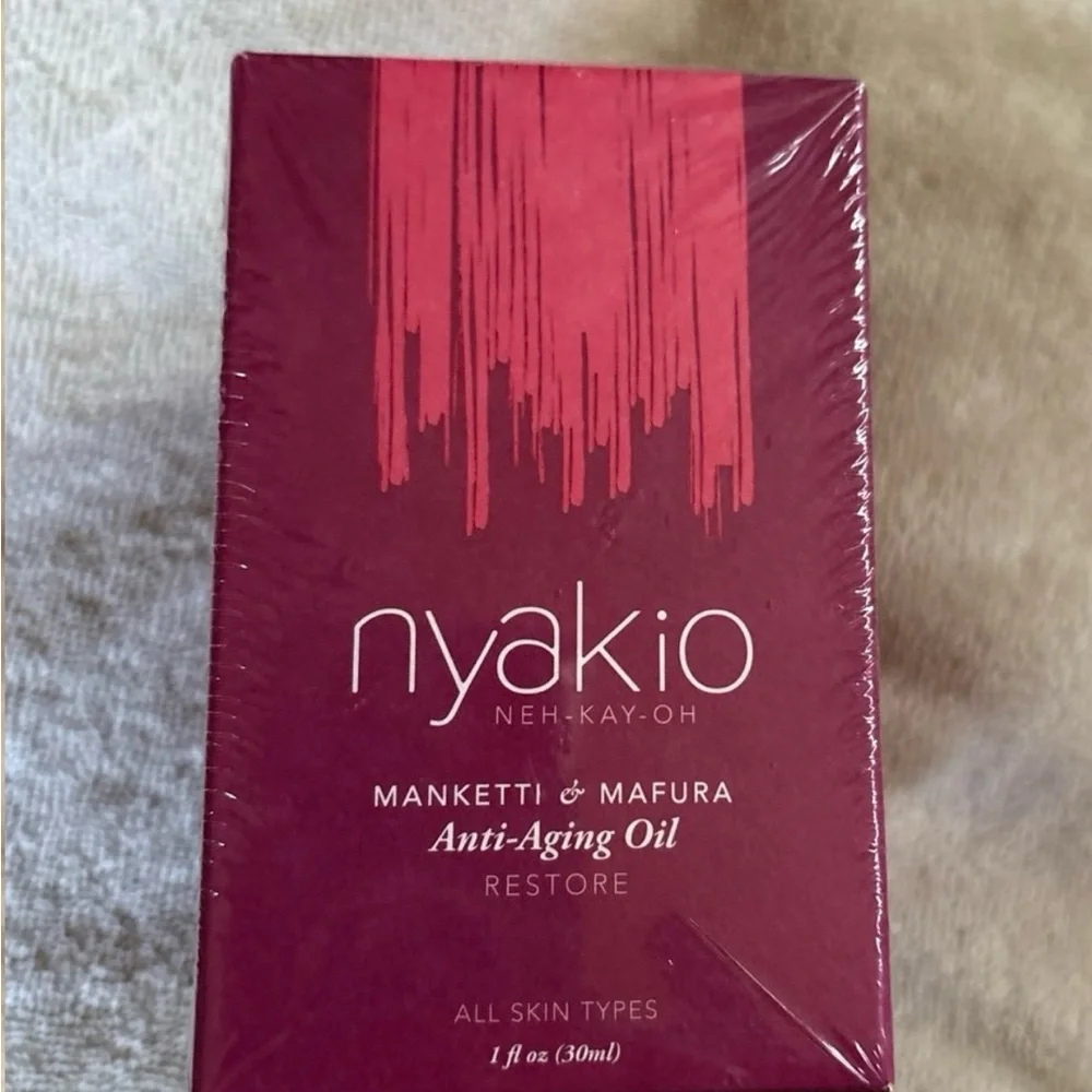 Nyakio Restore Anti-Aging Oil - Rich Red Packaging