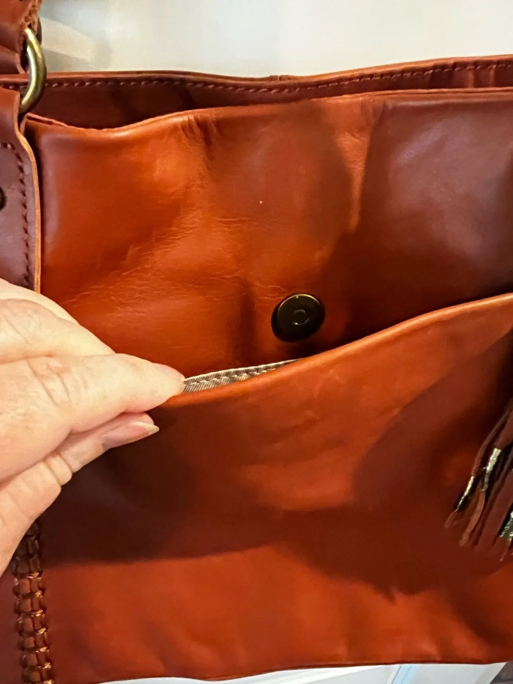The Sak Melrose Shoulder Bag Purse Brown Leather Tassel Charm Many Pockets