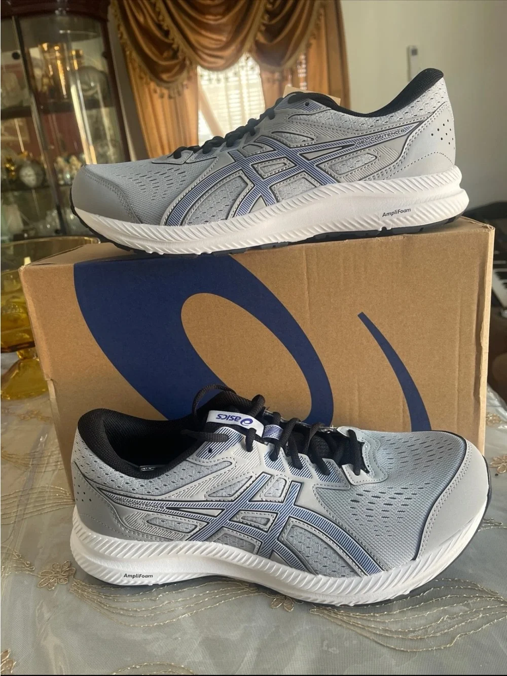 Asics back another