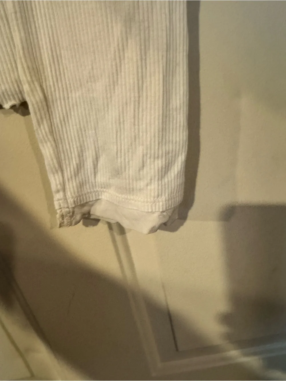 White Long-Sleeve Ribbed Top with Lettuce Hem