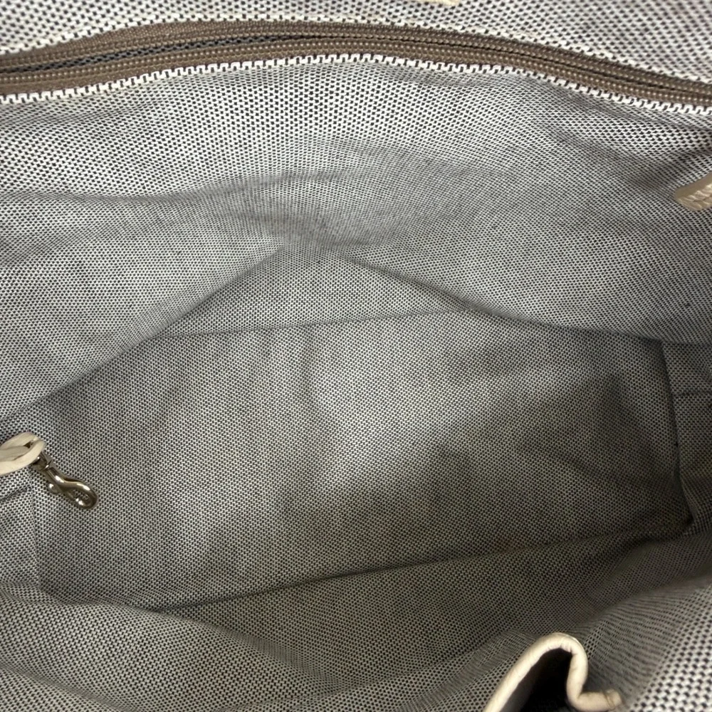 Dooney & Bourke includes office check