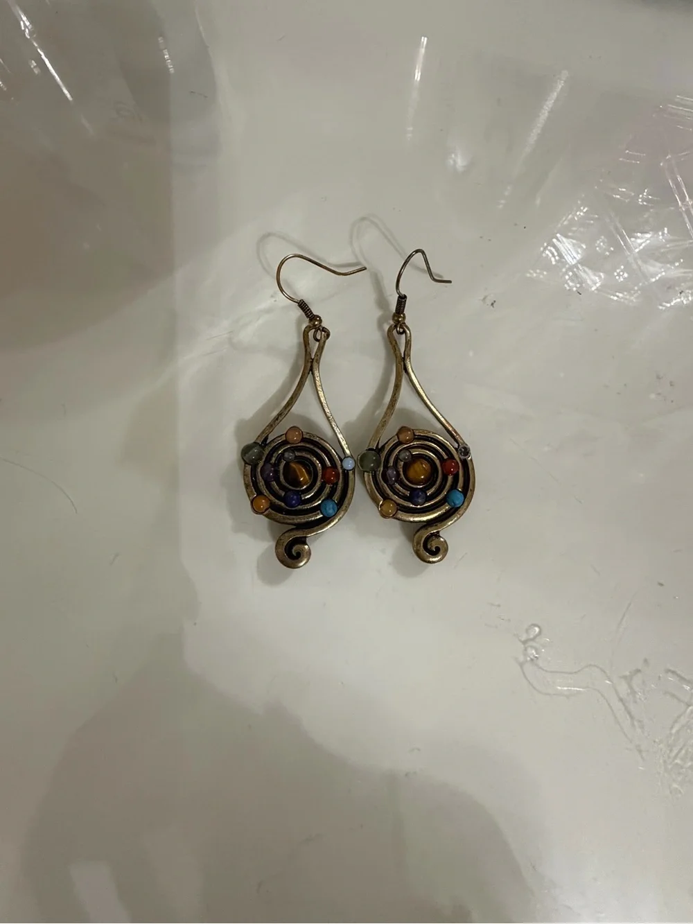 Antique gold earrings with spiral design and Multi colored beads