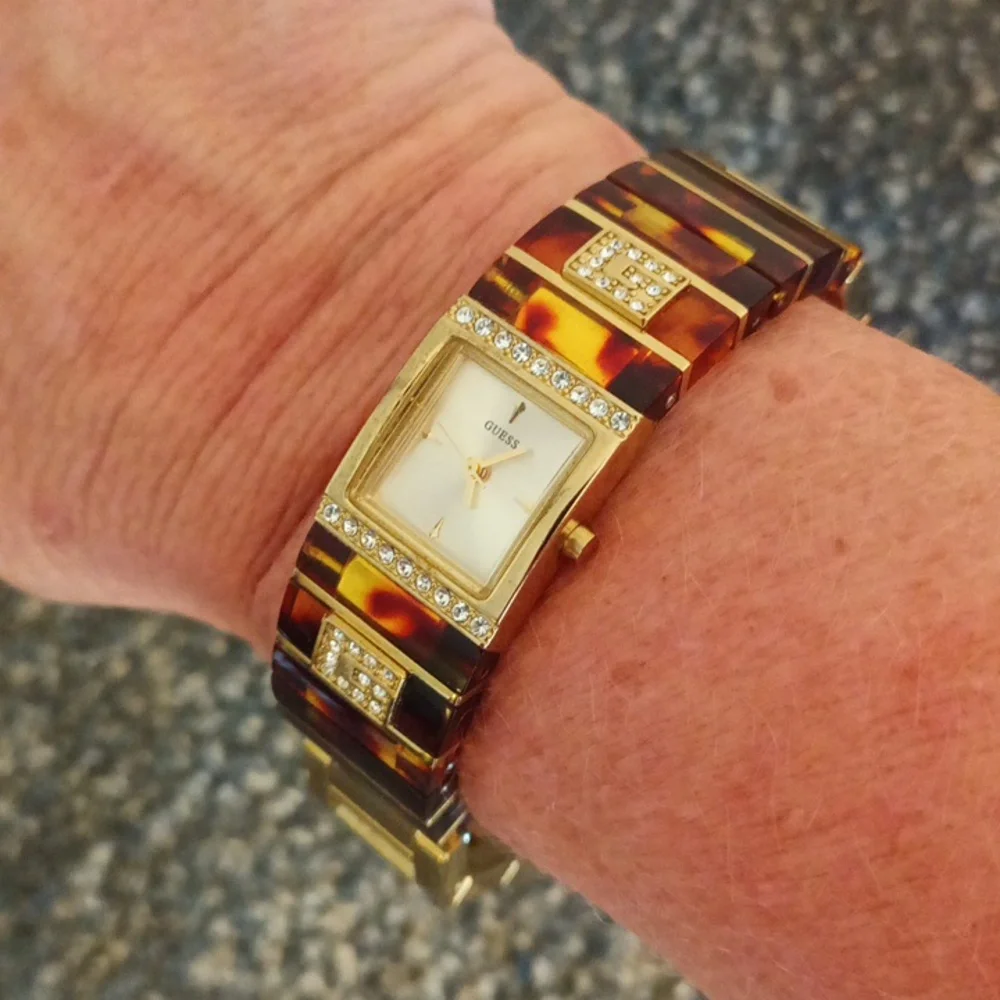 Guess gold tone