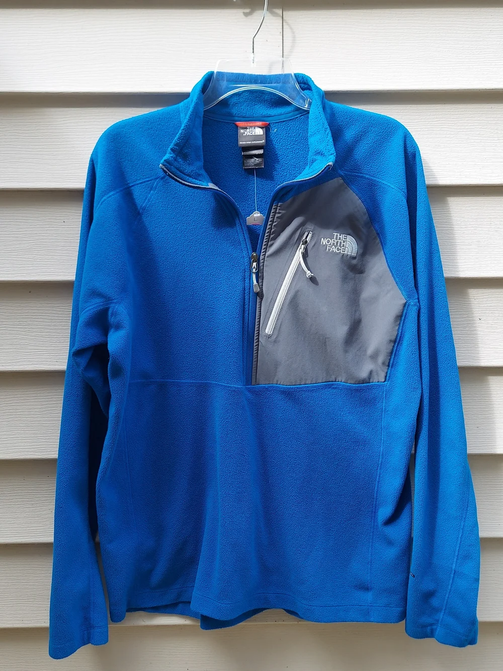 The North Face Men’s  Blue Fleece Quarter-Zip with Gray Chest Pocket