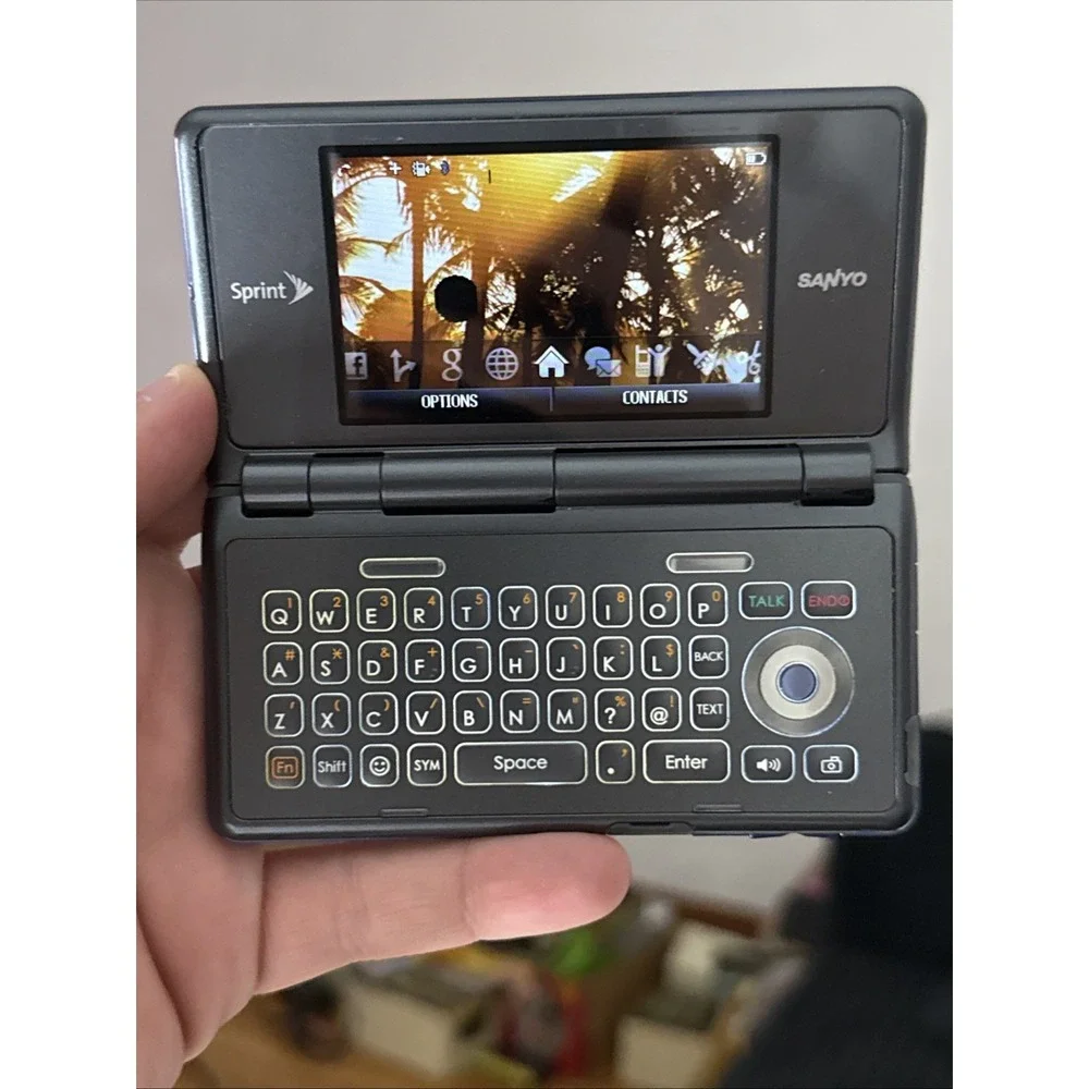 Sanyo Innuendo SCP-6780 Sprint Blue Kyocera Has Ink Spot Works Has Power Manual