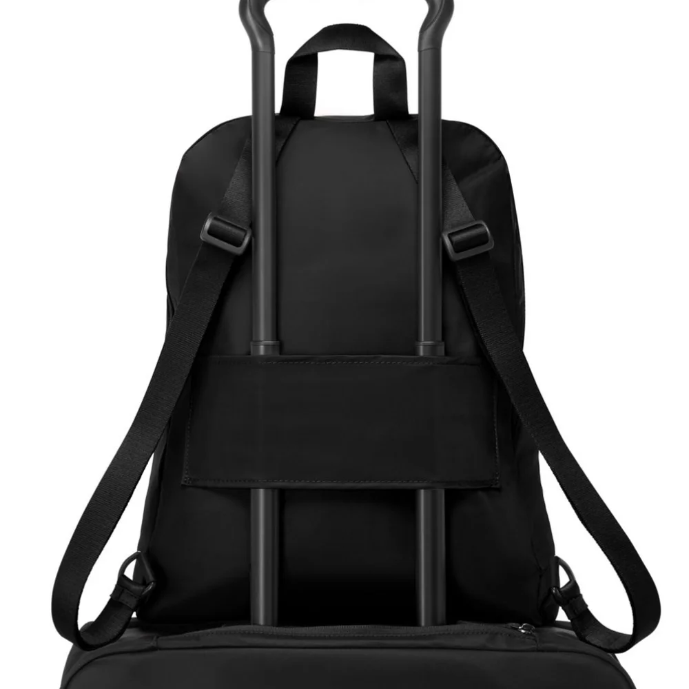 Tumi pouch included