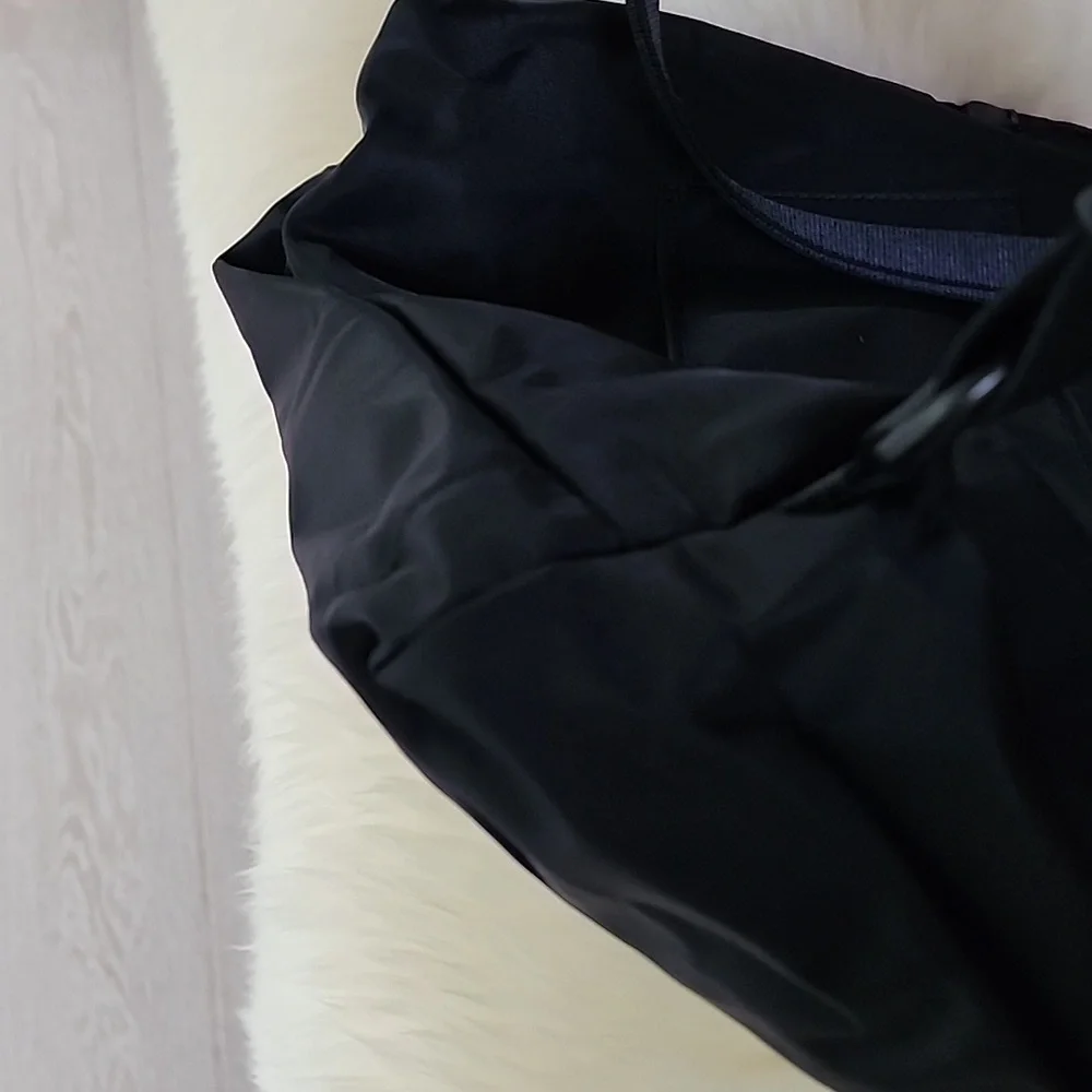 Tumi pouch included