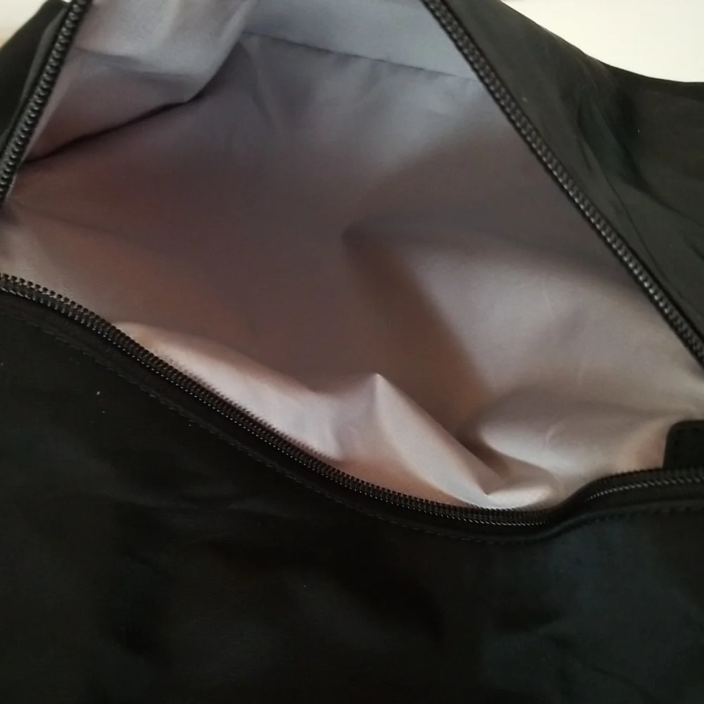 Tumi pouch included