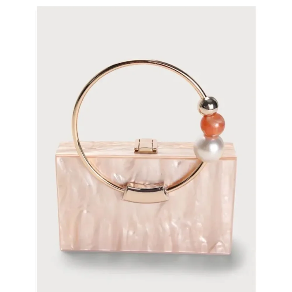 Lulu's Pearlescent Pink Acrylic Box Clutch with Gold Ring Handle