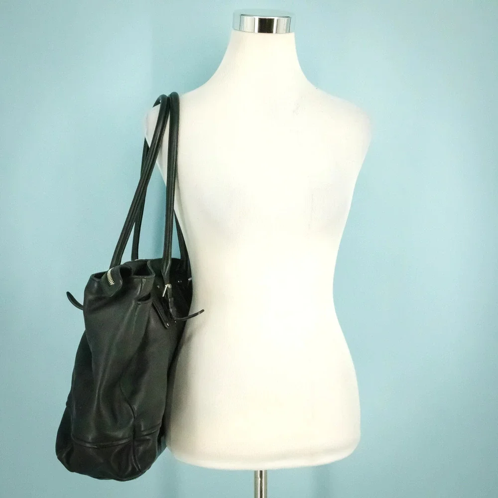 Tumi black leather
