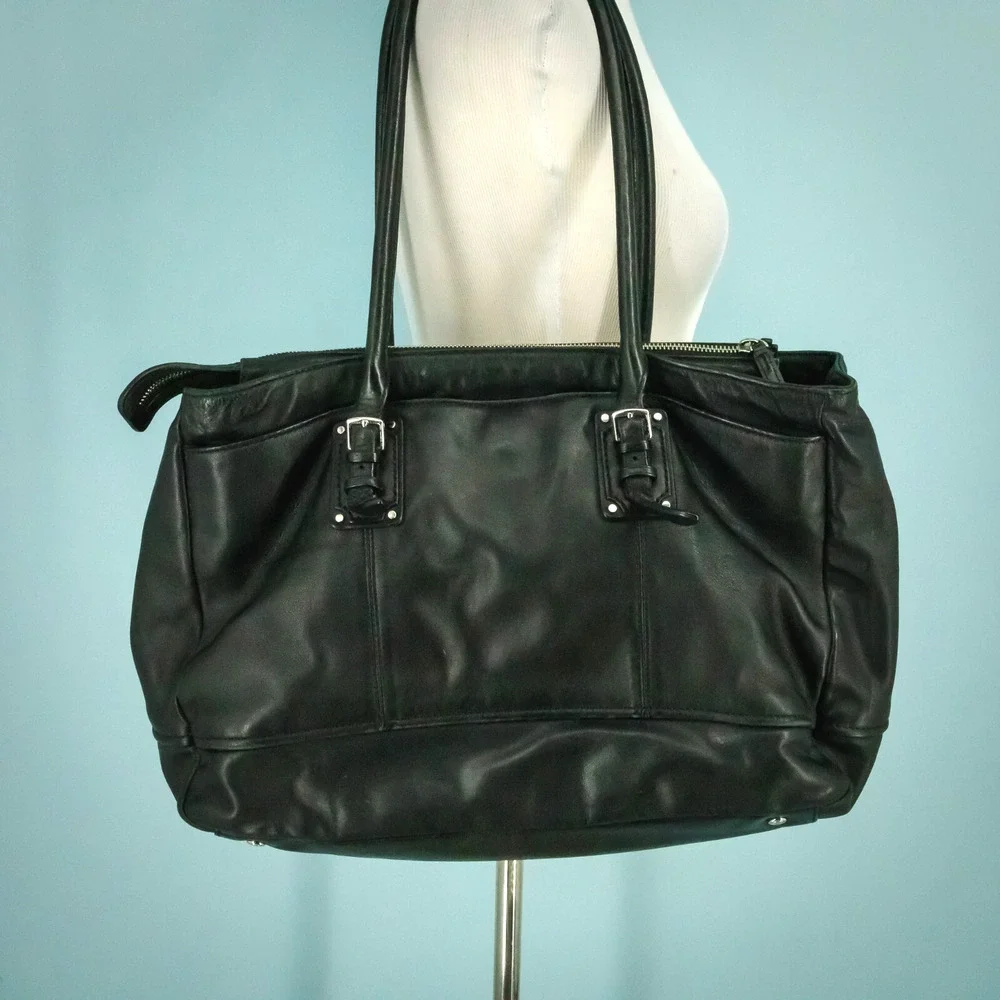 Tumi black leather