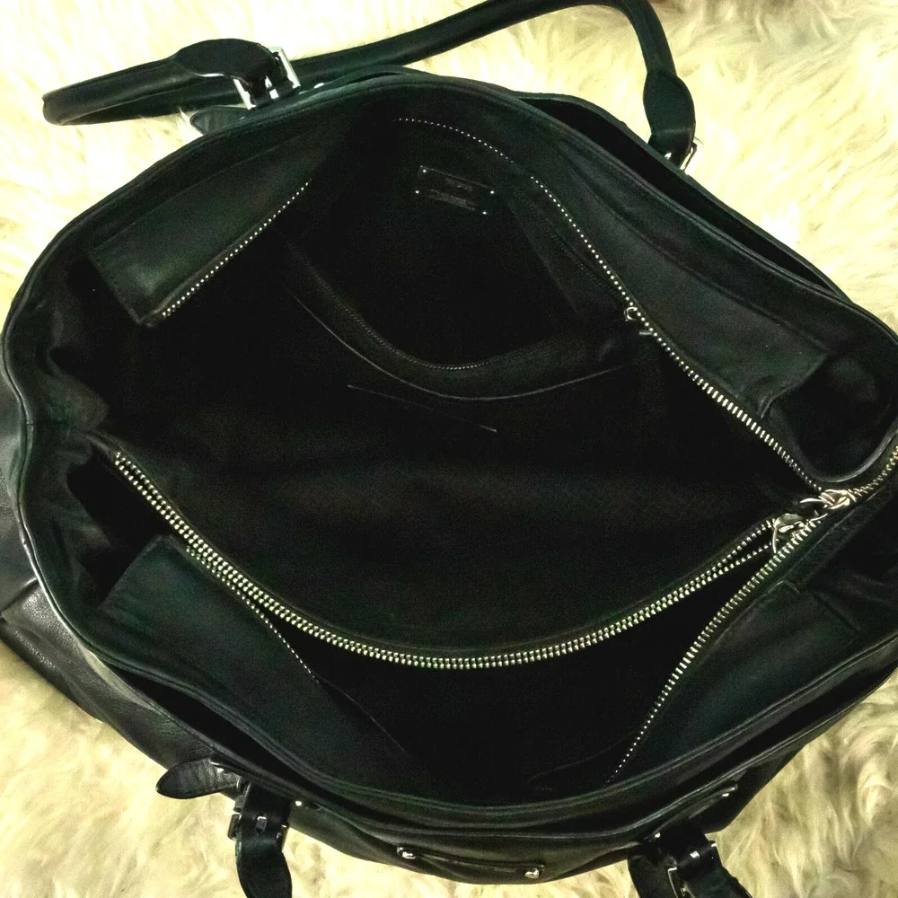 Tumi black leather