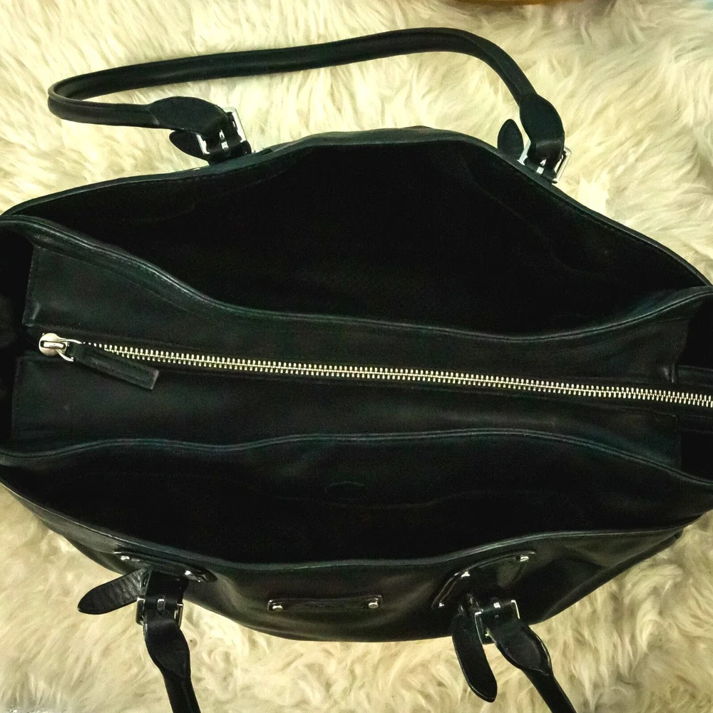 Tumi black leather