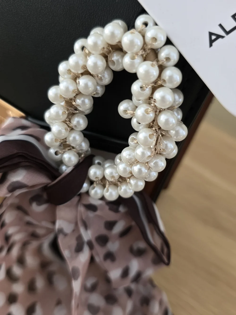 Aldo top charm