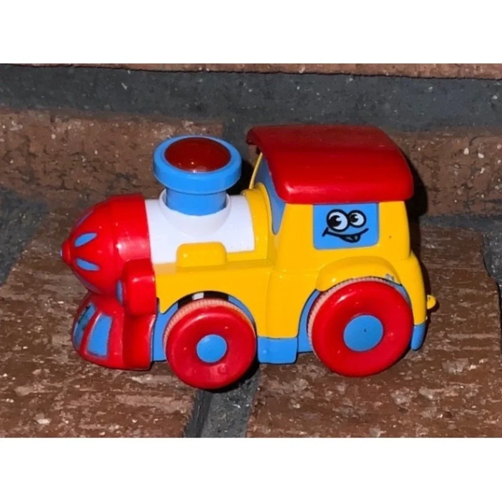 Red Yellow Blue Plastic Toy Train Engine with Cartoon Face Rolling Wheels 3